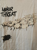 Light grey Minor Threat tshirt with black sheep amongst white sheep 