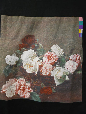 Floral print from Power Corruption and Lies album cover