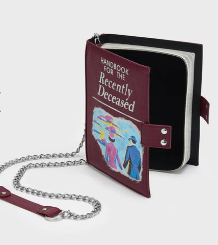 Licensed Beetlejuice book shaped novelty handbag with text Handbook for the Recently Deceased with chain strap and snap closure