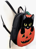 Black vinyl mini backpack with furry black cat in an orange pumpkin