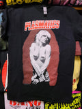 black tee with red lettering Plasmatics singer Wendy O Williams shirtless with black electrical tape over her bosoms