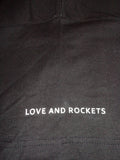 Love and Rockets band name print on right sleeve