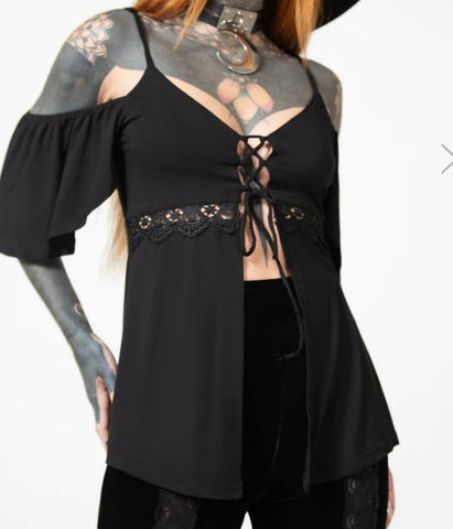 black flowing cold shoulder top with lace insert detailing adjustable lace front closure and adjustable straps a line silhouette